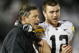 STATE COLLEGE, PA - SEPTEMBER 26:  Head coach Kirk Ferentz of the Iowa Hawkeyes talks with Ricky Stanzi #12 while playing the Penn State Nittnay Lions  on September 26, 2009 at Beaver Stadium in State College, Pennsylvania. Iowa won the game 21-10. (Photo by Gregory Shamus/Getty Images)