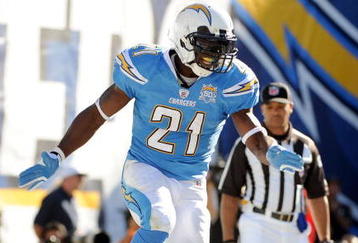 SAN DIEGO - NOVEMBER 01:  LaDainian Tomlinson #21 of the San Diego Chargers celebrates his second touchdown for a 21-7 lead over the Oakland Raiders during the second quarter at Qualcomm Stadium on November 1, 2009 in San Diego, California.  (Photo by Harry How/Getty Images)