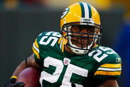 GREEN BAY, WI - NOVEMBER 01:  Running back Ryan Grant #25 of the Green Bay Packers carries the ball against the Minnesota Vikings during the second quarter of the game at Lambeau Field on November 1, 2009 in Green Bay, Wisconsin. (Photo by Scott Boehm/Getty Images)