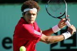 TOKYO - OCTOBER 11: Jo-Wilfried Tsonga of France plays a backhand in the Men's Singles Final match against Mikhail Youzhny of Russia during day seven of the Rakuten Open Tennis tournament at Ariake Colosseum on October 11, 2009 in Tokyo,Japan. (Photo by Koji Watanabe/Getty Images)