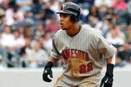 NEW YORK - MAY 17:  Carlos Gomez #22 of the Minnesota Twins runs against the New York Yankees on May 17, 2009 at Yankee Stadium in the Bronx borough of New York City. The Yankees defeated the Twins 3-2 in ten innings.  (Photo by Jim McIsaac/Getty Images)