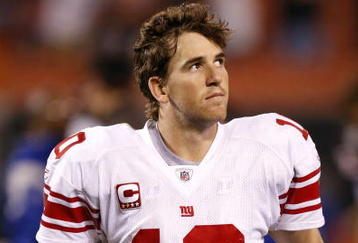 CLEVELAND - OCTOBER 13:  Eli Manning #10 of the New York Giants leaves the field after losing 35-14 to the Cleveland Browns on October 13, 2008 at Cleveland Browns Stadium in Cleveland, Ohio.  (Photo by Gregory Shamus/Getty Images)