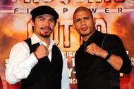 BEVERLY HILLS, CA - SEPTEMBER 14:  Manny Pacquiao and  Miguel Cotto pose for pictures during the press conference at the Beverly Hills Hotel on September 14, 2009 in Beverly Hills, California.  (Photo by Jacob De Golish/Jacob De Golish)