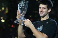 SHANGHAI, CHINA - NOVEMBER 16: (CHINA OUT) Novak Djokovic of Serbia holds up the winner's trophy following his victory over Nikolay Davydenko of Russia at the men's singles final match in the Tennis Masters Cup held at Qi Zhong Stadium on November 16, 2008 in Shanghai, China. Djokovic won 6-1, 7-5 to take the title. (Photo by China Photos/Getty Images)