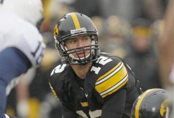IOWA CITY, IOWA - NOVEMBER 8: Quarterback Ricky Stanzi #12 of the Iowa Hawkeyes calls a play at the line during the second quarter of play against the Penn State Nittany Lions at Kinnick Stadium on November 8, 2008 in Iowa City, Iowa. Iowa defeated Penn State  24-23. (Photo by David Purdy/Getty Images)