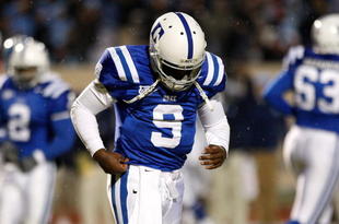 DURHAM, NC - NOVEMBER 29:  Quarterback Thaddeus Lewis #9 of the Duke Blue Devils trotts off the field after a short offensive series against the North Carolina Tar Heels during the game at Wallace Wade Stadium on November 29, 2008 in Durham, North Carolina.  (Photo by Kevin C. Cox/Getty Images)