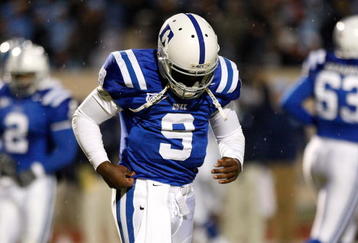 DURHAM, NC - NOVEMBER 29:  Quarterback Thaddeus Lewis #9 of the Duke Blue Devils trotts off the field after a short offensive series against the North Carolina Tar Heels during the game at Wallace Wade Stadium on November 29, 2008 in Durham, North Carolina.  (Photo by Kevin C. Cox/Getty Images)
