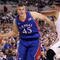 INDIANAPOLIS - MARCH 27:  Cole Aldrich #45 of the Kansas Jayhawks drives against Goran Suton #14 of the Michigan State Spartans during the third round of the NCAA Division I Men's Basketball Tournament at the Lucas Oil Stadium on March 27, 2009 in Indianapolis, Indiana.  (Photo by Andy Lyons/Getty Images)