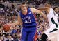 INDIANAPOLIS - MARCH 27:  Cole Aldrich #45 of the Kansas Jayhawks drives against Goran Suton #14 of the Michigan State Spartans during the third round of the NCAA Division I Men's Basketball Tournament at the Lucas Oil Stadium on March 27, 2009 in Indianapolis, Indiana.  (Photo by Andy Lyons/Getty Images)