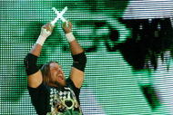LAS VEGAS - AUGUST 24:  Wrestler Triple H is introduced during the WWE Monday Night Raw show at the Thomas & Mack Center August 24, 2009 in Las Vegas, Nevada.  (Photo by Ethan Miller/Getty Images)