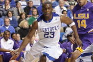 LEXINGTON, KY - FEBRUARY 28:  Jodie Meeks #23 of the Kentucky Wildcats drives to the basket against Garrett Temple #14 of the LSU Tigers during the SEC game at Rupp Arena on February 28, 2009 in Lexington, Kentucky.  (Photo by Andy Lyons/Getty Images)