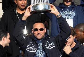 NEW YORK - NOVEMBER 06:  Captain Derek Jeter #2 of the New York Yankees celebrates with the championship trophy during the New York Yankees World Series Victory Celebration at City Hall on November 6, 2009 in New York, New York.  (Photo by Jim McIsaac/Getty Images)