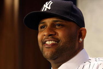 NEW YORK - DECEMBER 18:  CC Sabathia talks to the media during a press conference to announce his signing to the New York Yankees at Yankee Stadium on December 18, 2008  in the Bronx borough of New York City.  (Photo by Nick Laham/Getty Images)