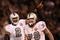 OAKLAND, CA - SEPTEMBER 14:  (L-R) JaMarcus Russell #2 and Robert Gallery #76 of the Oakland Raiders celebrate after Russell threw a 57-yard touchdown pass to Louis Murphy #18 in the fourth quarter against the San Diego Chargers on September 14, 2009 at the Oakland-Alameda County Coliseum in Oakland, California.  (Photo by Ezra Shaw/Getty Images)