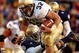 SOUTH BEND, IN - NOVEMBER 8:  In this U.S. Navy handout photo, Navy fullback Kyle Eckel evades a Notre Dame defender to gain yardage during the Navy's Midshipmen's 27-24 loss to the Fighting Irish November 8, 2003 in South Bend, Indiana.  (Photo by Scott Allen/U.S. Navy via Getty Images)