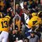 BERKELEY, CA - NOVEMBER 07:  Jahvid Best #4 of the California Golden Bears jumps into the endzone for a touchdown against the Oregon State Beavers at California Memorial Stadium on November 7, 2009 in Berkeley, California.  (Photo by Jed Jacobsohn/Getty Images)