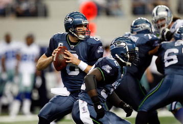 ARLINGTON, TX - NOVEMBER 01:  Quarterback Matt Hasselbeck #8 of the Seattle Seahawks drops back to pass against the Dallas Cowboys at Cowboys Stadium on November 1, 2009 in Arlington, Texas.  (Photo by Ronald Martinez/Getty Images)