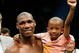 LAS VEGAS - APRIL 11: Paul Williams holds his son Paul Williams Jr. as he celebrates defeating Winky Wright in a unanimous decision in their middleweight bout at the Mandalay Bay Events Center April 11, 2009 in Las Vegas, Nevada. (Photo by Ethan Miller/Getty Images)