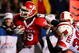 PISCATAWAY, NJ - DECEMBER 04:  Jourdan Brooks #39 of the Rutgers Scarlet Knights runs a fourth quarter touchdown against Daniel Covington #30 of the Louisville Cardinals at Rutgers Stadium on December 4, 2008 in Piscataway, New Jersey.  (Photo by Jim McIsaac/Getty Images)