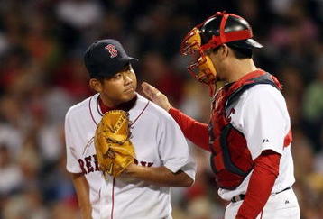 BOSTON - SEPTEMBER 15:  Daisuke Matsuzaka #18 and Jason Varitek #33 of the Boston Red Sox talk in between pitches in the fifth inning against the Los Angeles Angels of Anaheim on September 15, 2009 at Fenway Park in Boston, Massachusetts. The Red Sox defeated the Rays 3-1.  (Photo by Elsa/Getty Images)