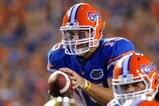 GAINESVILLE, FL - NOVEMBER 7: Quarterback Tim Tebow #15 of the Florida Gators takes a snap against the Vanderbilt Commodores  November 7, 2009 at Ben Hill Griffin Stadium in Gainesville, Florida.  (Photo by Al Messerschmidt/Getty Images)