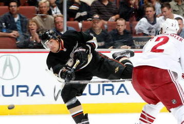 ANAHEIM, CA - NOVEMBER 07:  Teemu Selanne #8 of the Anaheim Ducks takes a shot in front of James Vandermeer #2 of the Phoenix Coyotes in the first period at the Honda Center on November 7, 2009 in Anaheim, California.  (Photo by Jeff Gross/Getty Images)