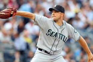 NEW YORK - JULY 01:  Jarrod Washburn #56 of the Seattle Mariners pitches against the New York Yankees on July 1, 2009 at Yankee Stadium in the Bronx borough of New York City.  (Photo by Jim McIsaac/Getty Images)