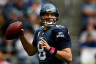 SEATTLE , WA - OCTOBER 18:  Quarterback Matt Hasselbeck #8 of the Seattle Seahawks throws a pass against the Arizona Cardinals at Qwest Field on October 18, 2009 in Seattle, Washington.  (Photo by Jonathan Ferrey/Getty Images)