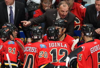 CALGARY, CANADA - OCTOBER 28:  Head Coach Brent Sutter of the Calgary Flames instructs his players during a break in game action against the Colorado Avalanche on October 28, 2009 at the Pengrowth Saddledome in Calgary, Alberta, Canada.  The Avalanche defeated the Flames 3-2. (Photo by Dale MacMillan/Getty Images)