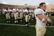SOUTH BEND, IN - NOVEMBER 12:  Marshall Green #64 of the Navy Midshipman (R) stands with his teammates during a salute following a game against the Notre Dame Fighting Irish on November 12, 2005 at Notre Dame Stadium in South Bend, Indiana. Notre Dame defeated Navy 42-21.  (Photo by Jonathan Daniel/Getty Images)