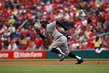 ST. LOUIS - APRIL 6:  Nyjer Morgan #3 of the Pittsburgh Pirates runs the bases against the St. Louis Cardinals during Opening Day on April 6, 2009 at Busch Stadium in St. Louis, Missouri.  The Pirates beat the Cardinals 6-4. (Photo by Dilip Vishwanat/Getty Images)  