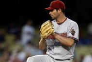 LOS ANGELES, CA - AUGUST 31: Pitcher Doug Davis #49 of the Arizona Diamondbacks throws a pitch against the Los Angeles Dodgers on August 31, 2009 at Dodger Stadium in Los Angeles, California. (Photo by Stephen Dunn/Getty Images)