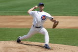 CHICAGO - JULY 26: Rich Harden #40 of the Chicago Cubs delivers the pitch during the game against the Cincinnati Reds on July 26, 2009 at Wrigley Field in Chicago, Illinois. (Photo by Jonathan Daniel/Getty Images) 