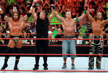 LAS VEGAS - AUGUST 24:  (L-R) Wrestler Triple H, World Wrestling Entertainment Inc. Chairman Vince McMahon, and wrestlers John Cena and Shawn Michaels pose in the ring during the WWE Monday Night Raw show at the Thomas & Mack Center August 24, 2009 in Las Vegas, Nevada.  (Photo by Ethan Miller/Getty Images)