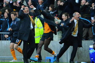HULL, ENGLAND - NOVEMBER 08: Hull City manager Phil Brown celebrates his teams late winning goal during the Barclays Premier League match between Hull City and Stoke City at the KC Stadium on November 8, 2009 in Hull, England. (Photo by Michael Regan/Getty Images)