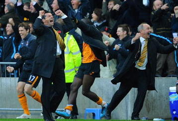 HULL, ENGLAND - NOVEMBER 08: Hull City manager Phil Brown celebrates his teams late winning goal during the Barclays Premier League match between Hull City and Stoke City at the KC Stadium on November 8, 2009 in Hull, England.  (Photo by Michael Regan/Getty Images)
