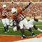 AUSTIN, TX - NOVEMBER 7:  Running back Cody Johnson #31 of the Texas Longhorns scores his second touchdown against the UCF Knights, a third down 13-yard run, on November 7, 2009 at Darrell K Royal - Texas Memorial Stadium in Austin, Texas.  Texas leads 14-3 at the half.  (Photo by Brian Bahr/Getty Images)