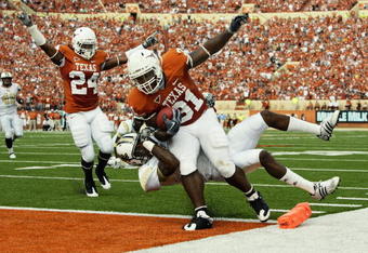 AUSTIN, TX - NOVEMBER 7:  Running back Cody Johnson #31 of the Texas Longhorns scores his second touchdown against the UCF Knights, a third down 13-yard run, on November 7, 2009 at Darrell K Royal - Texas Memorial Stadium in Austin, Texas.  Texas leads 14-3 at the half.  (Photo by Brian Bahr/Getty Images)