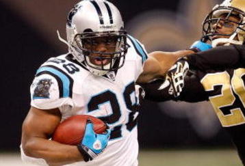 NEW ORLEANS - DECEMBER 28: Jonathan Stewart #28 of the Carolina Panthers is pushed out of bounds by Randall Gay #20 of the New Orleans Saints on December 28, 2008 at the Superdome in New Orleans, Louisiana. The Panthers defated the Saints 33-31.  (Photo by Chris Graythen/Getty Images)