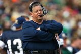 SOUTH BEND, IN - OCTOBER 03: Head coach Charlie Weis of the Notre Dame Fighting Irish watches as his team takes on the Washington Huskies on October 3, 2009 at Notre Dame Stadium in South Bend, Indiana.  Notre Dame defeated Washington 37-30 in overtime.  (Photo by Jonathan Daniel/Getty Images)