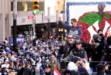 NEW YORK - NOVEMBER 06:  Jorge Posada # 20 of the New York Yankees celebrates on a float during the Yankees World Series Victory Parade on November 6, 2009 in New York City.  (Photo by Michael Loccisano/Getty Images)