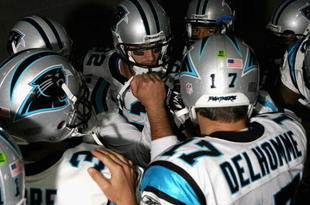 GLENDALE, AZ - NOVEMBER 01:  Gary Barnidge #82 and quarterback Jake Delhomme #17 of the Carolina Panthers huddle up before the NFL game against the Arizona Cardinals at the Universtity of Phoenix Stadium on November 1, 2009 in Glendale, Arizona. The Panthers defeated the Cardinals 34-21.  (Photo by Christian Petersen/Getty Images)