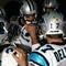 GLENDALE, AZ - NOVEMBER 01:  Gary Barnidge #82 and quarterback Jake Delhomme #17 of the Carolina Panthers huddle up before the NFL game against the Arizona Cardinals at the Universtity of Phoenix Stadium on November 1, 2009 in Glendale, Arizona. The Panthers defeated the Cardinals 34-21.  (Photo by Christian Petersen/Getty Images)
