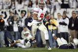 STATE COLLEGE, PA - NOVEMBER 7: Wide receiver DeVier Posey #8 of the Ohio State Buckeyes catches a 62 yard touchdown pass during a game against the Penn State Nittany Lions on November 7, 2009 at Beaver Stadium in State College, Pennsylvania. Ohio State won 24-7. (Photo by Hunter Martin/Getty Images)