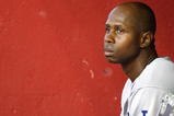 PHOENIX - SEPTEMBER 07:  Juan Pierre #9 of the Los Angeles Dodgers sits in the dugout during the major league baseball game against the Arizona Diamondbacks at Chase Field on September 7, 2009 in Phoenix, Arizona. The Dodgers defeated the Diamondbacks 7-2.  (Photo by Christian Petersen/Getty Images)