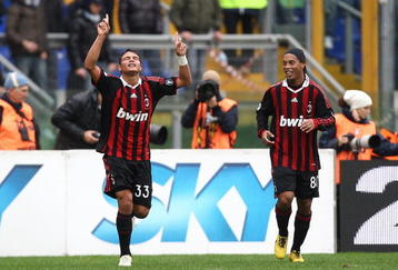 ROME - NOVEMBER 08:  Thiago Silva (L) of AC Milan celebrates with Ronaldinho after scoring the first goal during the Serie A match between SS Lazio and AC Milan at Stadio Olimpico on November 8, 2009 in Rome, Italy.  (Photo by Paolo Bruno/Getty Images)
