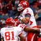 NEW ORLEANS - OCTOBER 17:  Justin Johnson #3 of the Houston Cougars celebrates after a touchdown against the Tulane Green Wave at the Louisiana Superdome on October 17, 2009 in New Orleans, Louisiana.  The Cougars defeated the Green Wave 44-16.  (Photo by Chris Graythen/Getty Images)