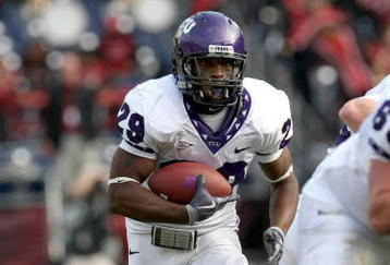 SAN DIEGO - NOVEMBER 07:  Running back Matthew Tucker #29 of the Texas Christian University Horned Frogs carries the ball at the start of a 30 yard touchdown run in the third quarter against the San Diego State Aztecs on November 7, 2009 at Qualcomm Stadium in San Diego, California.   TCU won 55-12.  (Photo by Stephen Dunn/Getty Images)