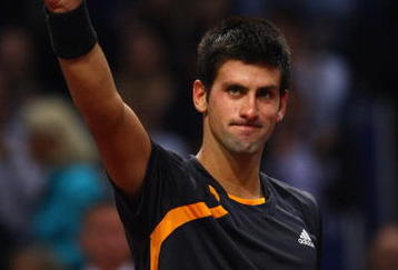 BASEL, SWITZERLAND - NOVEMBER 08:  Novak Djokovic of Serbia celebrates at match point after defeating Roger Federer of Switzerland in the final during Day Seven of the Davidoff Swiss Indoors Tennis at St Jakobshalle on November 8, 2009 in Basel, Switzerland.  (Photo by Julian Finney/Getty Images)