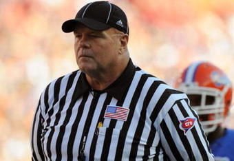 GAINESVILLE, FL - OCTOBER 17: SEC umpire Ronnie Jones watches play as the Florida Gators host the Arkansas Razorbacks October 17, 2009 at Ben Hill Griffin Stadium in Gainesville, Florida.  (Photo by Al Messerschmidt/Getty Images)
